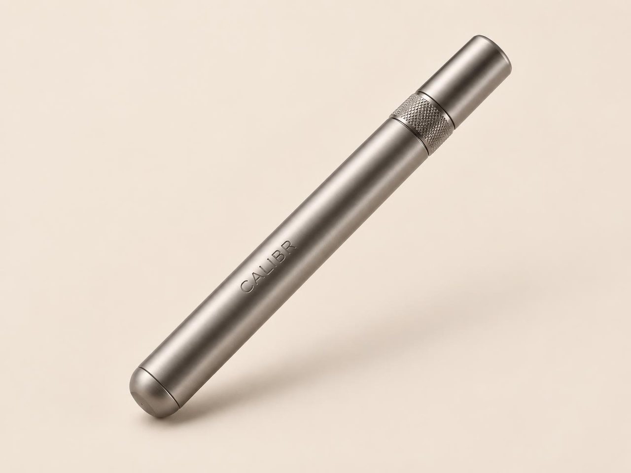 The Titanium Pen on a soft studio backdrop